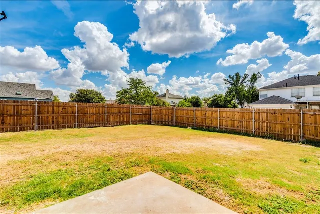 a view of a yard with a trees