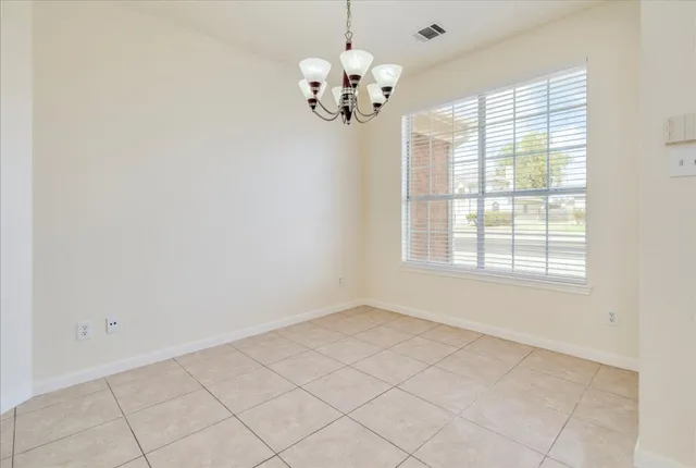 a view of a chandelier in a room