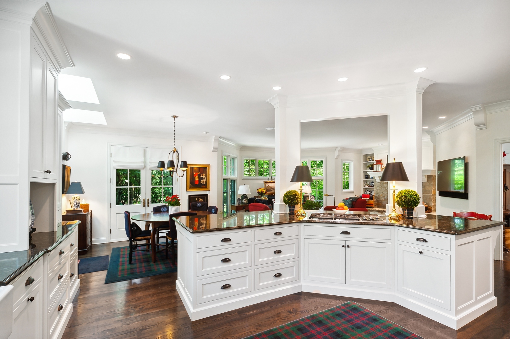 370 North Mayflower Road Lake Forest, IL 60045 - Photo 12 of 29 a view of living room with granite countertop furniture and flat screen tv