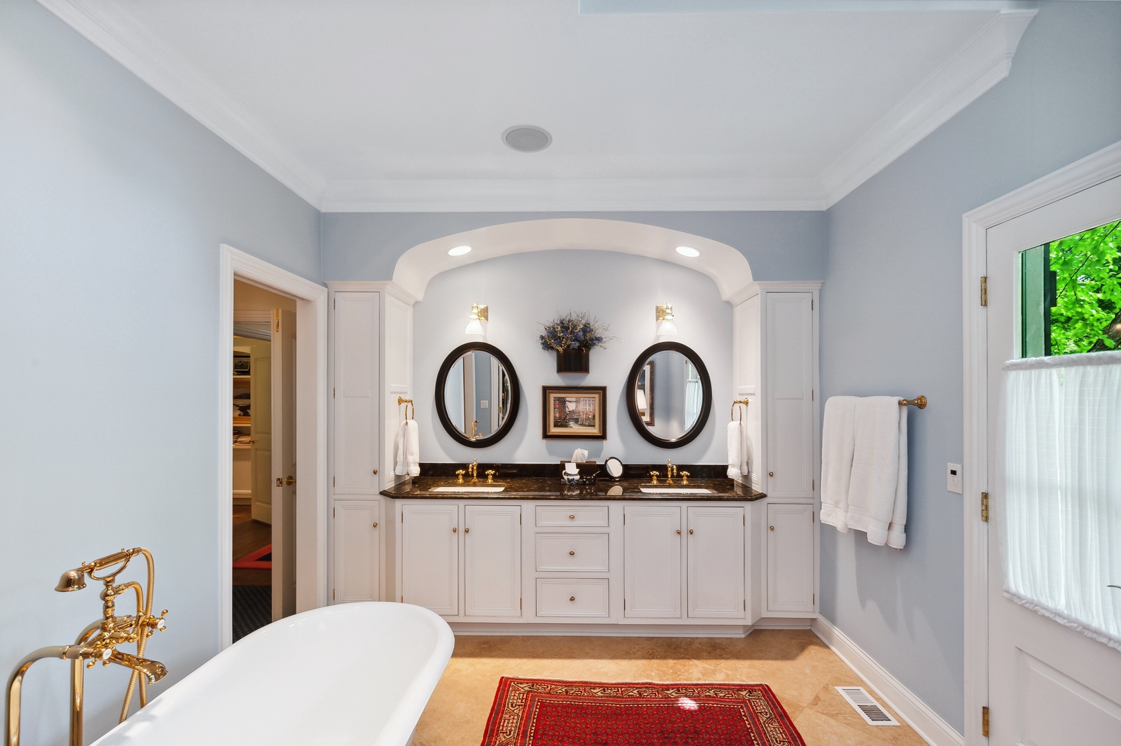 370 North Mayflower Road Lake Forest, IL 60045 - Photo 16 of 29 a bathroom with a sink and a mirror