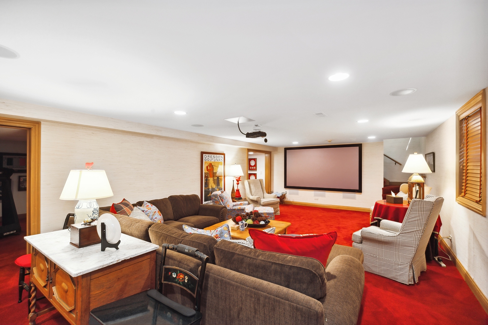 370 North Mayflower Road Lake Forest, IL 60045 - Photo 21 of 29 a living room with furniture and a flat screen tv