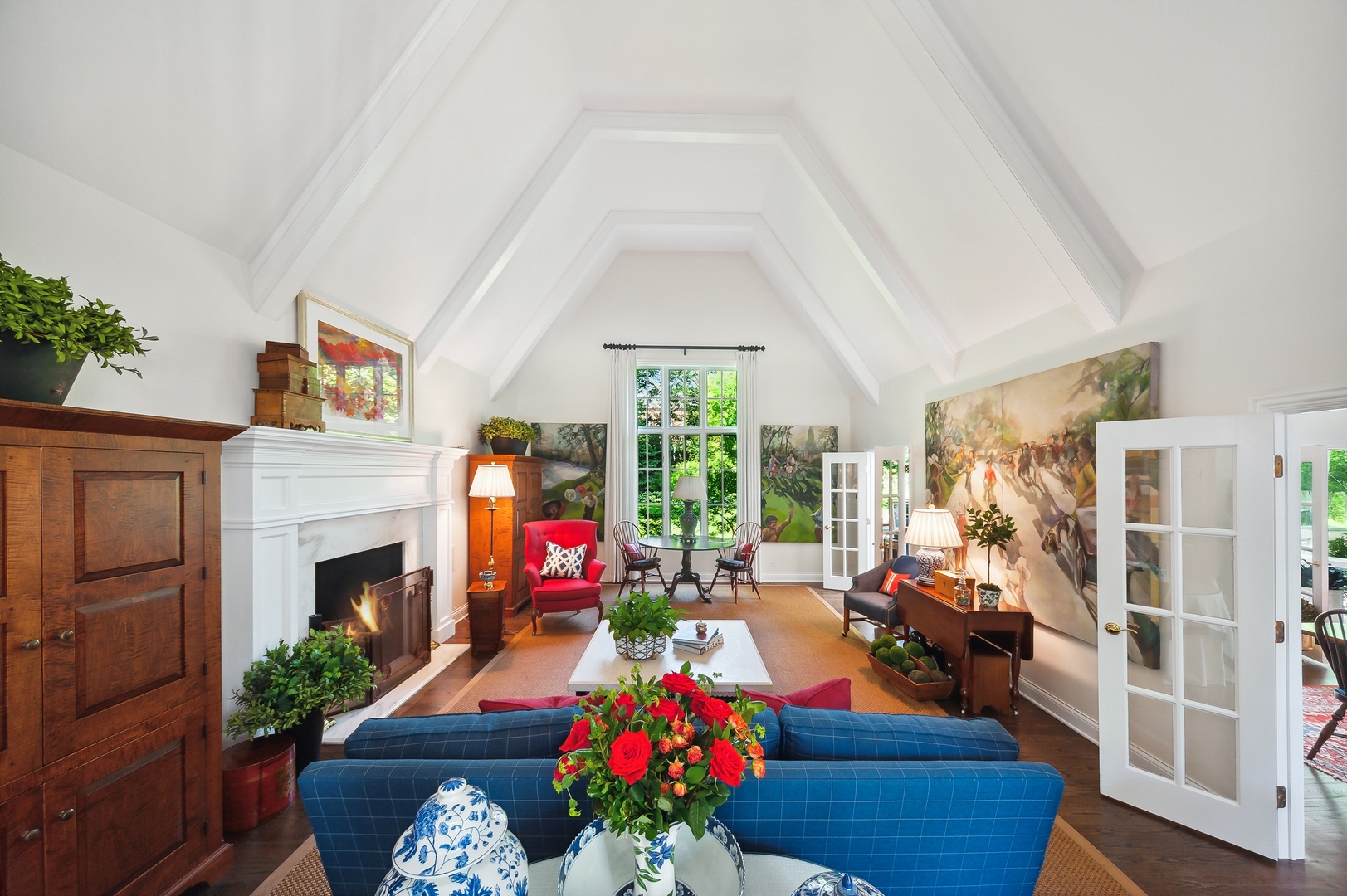 370 North Mayflower Road Lake Forest, IL 60045 - Photo 5 of 29 a living room with furniture a fireplace and a floor to ceiling window
