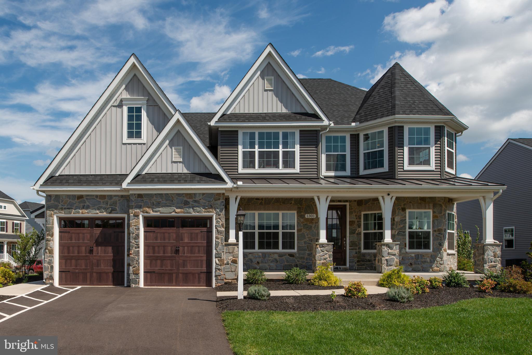 200 Parkview Way, Unit NOTTINGHAM Newtown Square, PA 19073 - Photo 1 of 37 front view of a house with a yard