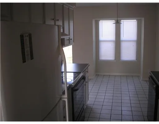 a view of empty room with windows