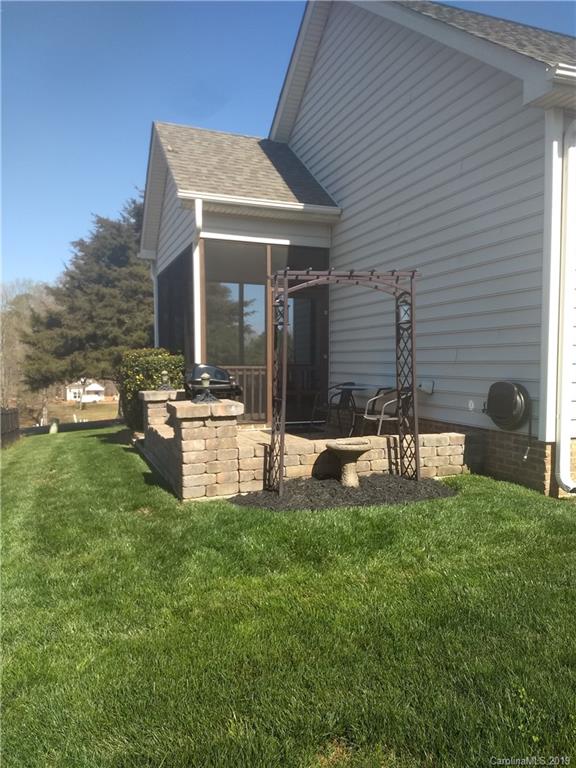 206 Broad Street Locust, NC 28097 - Photo 4 of 5 a view of a house with backyard