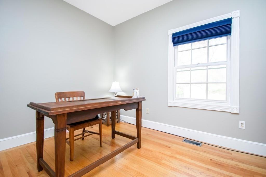 51 Steele Road Enfield, CT 06082 - Photo 19 of 42 a view of a workspace with furniture and a window