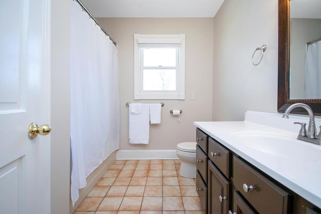 51 Steele Road Enfield, CT 06082 - Photo 29 of 42 a bathroom with a sink and a toilet