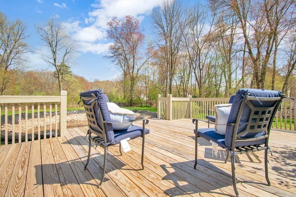 51 Steele Road Enfield, CT 06082 - Photo 36 of 42 a view of a chairs on wooden deck