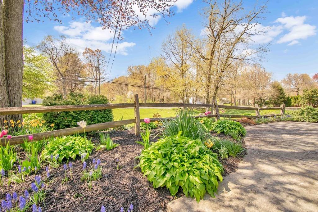 51 Steele Road Enfield, CT 06082 - Photo 4 of 42 a view of a yard with a fountain