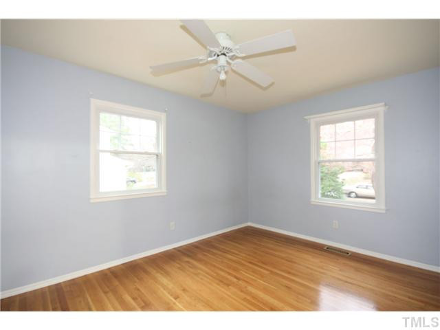 5412 Newhall Road Durham, NC 27713 - Photo 17 of 25 Bedroom 3 also has a gleaming hardwood floor. Bedroom