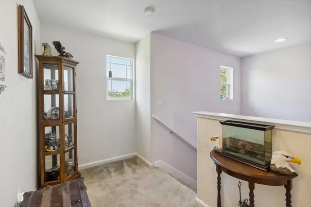 a bedroom with a bed and a dresser in it