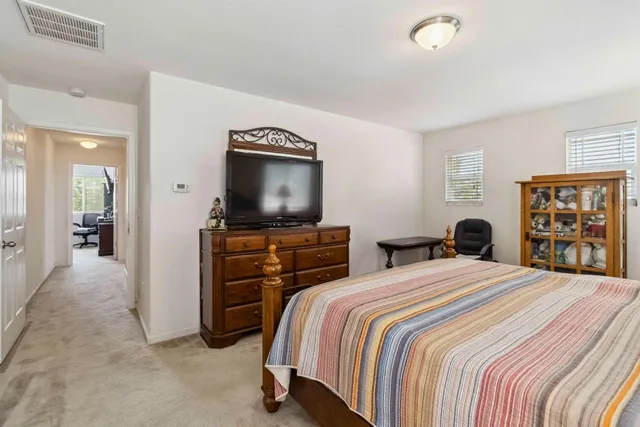 a view of bathroom with dual sinks