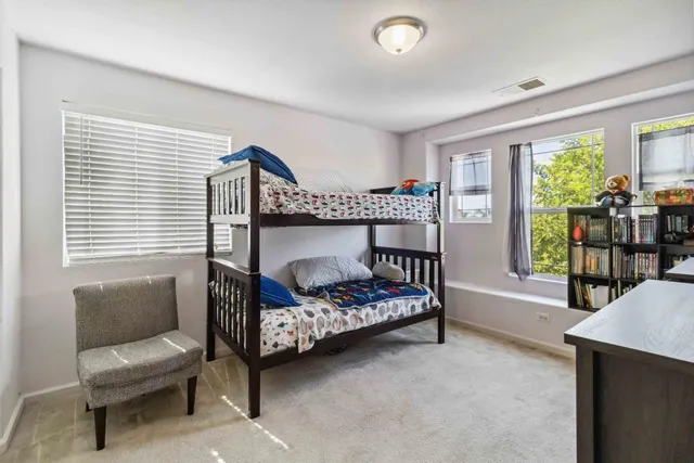 a view of room with furniture and flat screen tv