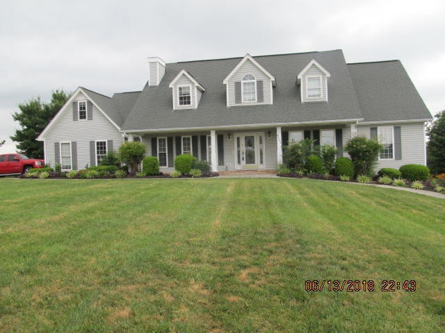 8200 Greenbriar Road Talbott, TN 37877 - Photo 1 of 18 a front view of a house with a yard