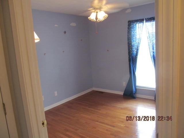 8200 Greenbriar Road Talbott, TN 37877 - Photo 8 of 18 a view of an empty room with a window