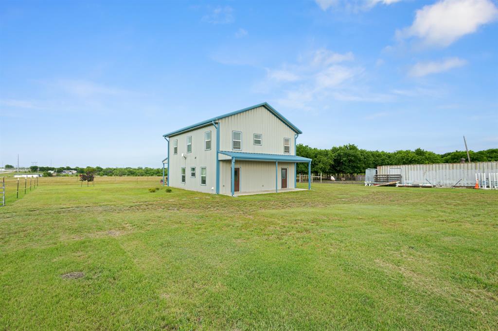 124 County Road 4511 Decatur, TX 76234 - Photo 30 of 39 a house with a field