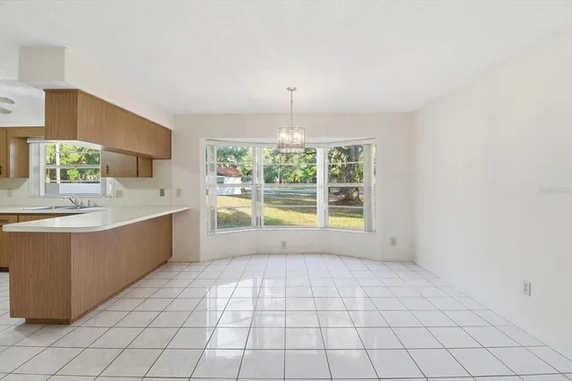 a large white room with a large window
