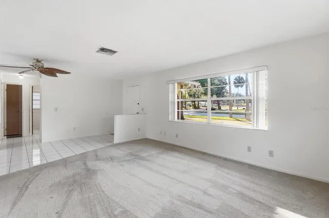 an empty room with windows