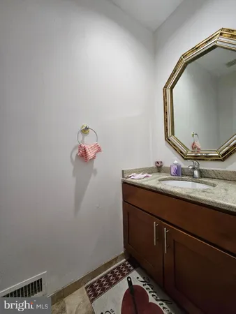 a bathroom with a toilet and a sink