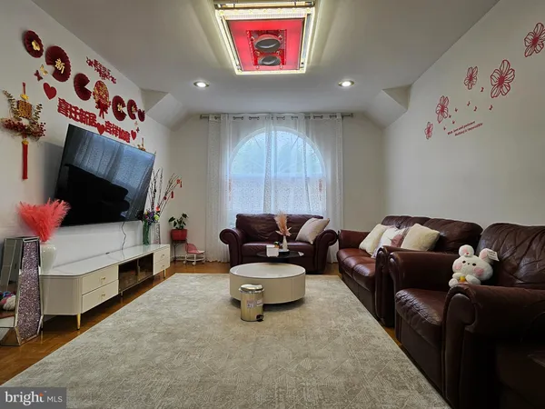 a living room with furniture and a couch