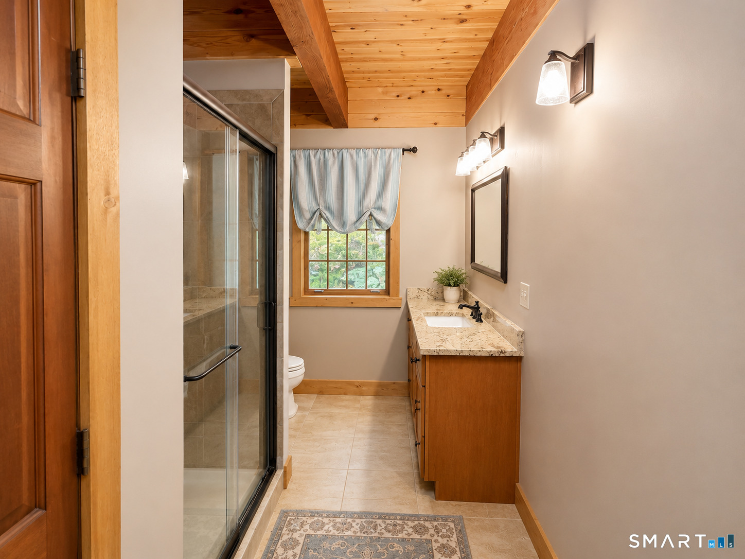 44 Pine Road Colebrook, CT 06021 - Photo 15 of 40 a bathroom with a sink a mirror and shower