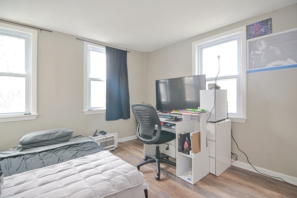 8 Maple Avenue Danvers, MA 01923 - Photo 17 of 42 a bedroom with furniture and a window