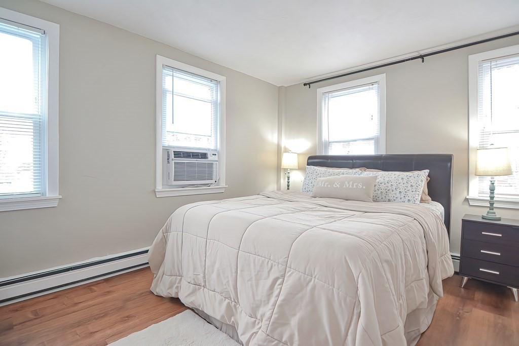 8 Maple Avenue Danvers, MA 01923 - Photo 21 of 42 a bedroom with a bed and a window