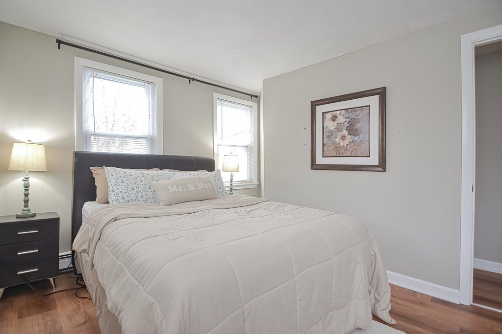 8 Maple Avenue Danvers, MA 01923 - Photo 22 of 42 a bedroom with a bed and a window