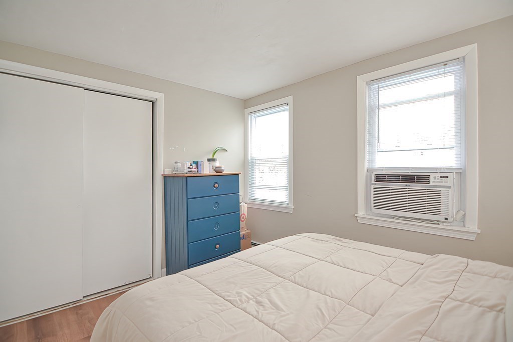 8 Maple Avenue Danvers, MA 01923 - Photo 27 of 42 a bedroom with a bed and a window