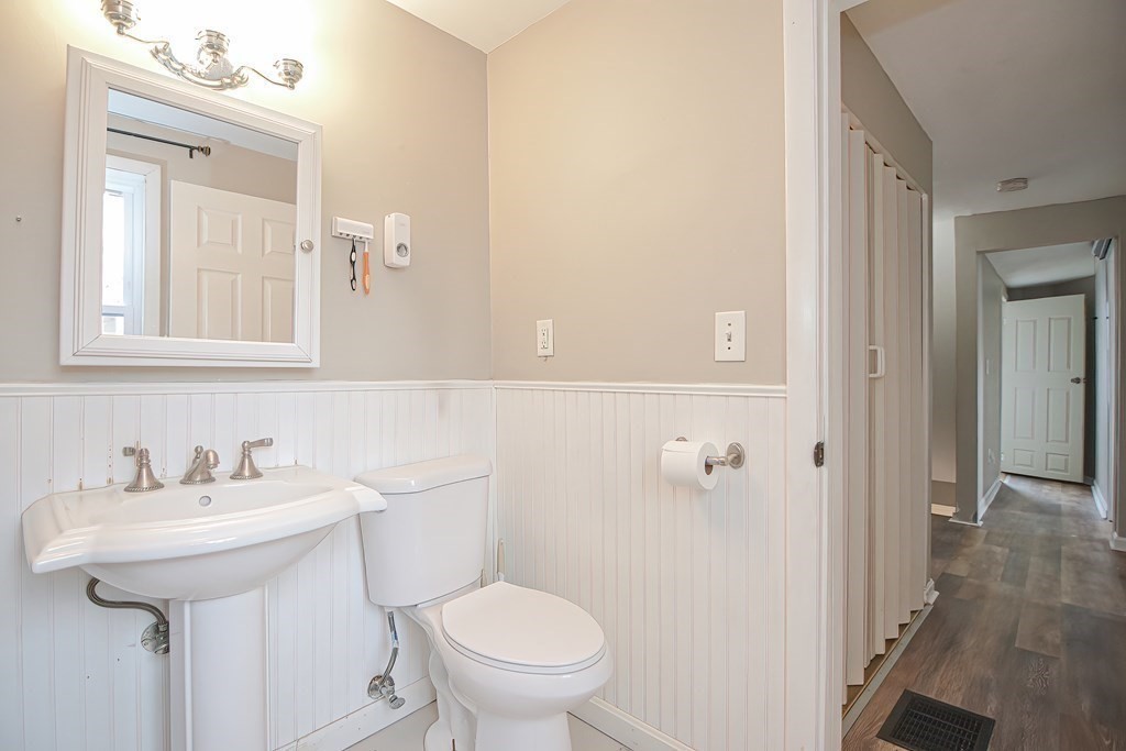 8 Maple Avenue Danvers, MA 01923 - Photo 32 of 42 a bathroom with a sink a toilet and shower