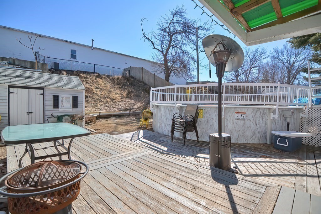 8 Maple Avenue Danvers, MA 01923 - Photo 40 of 42 a view of a chairs and table on the deck
