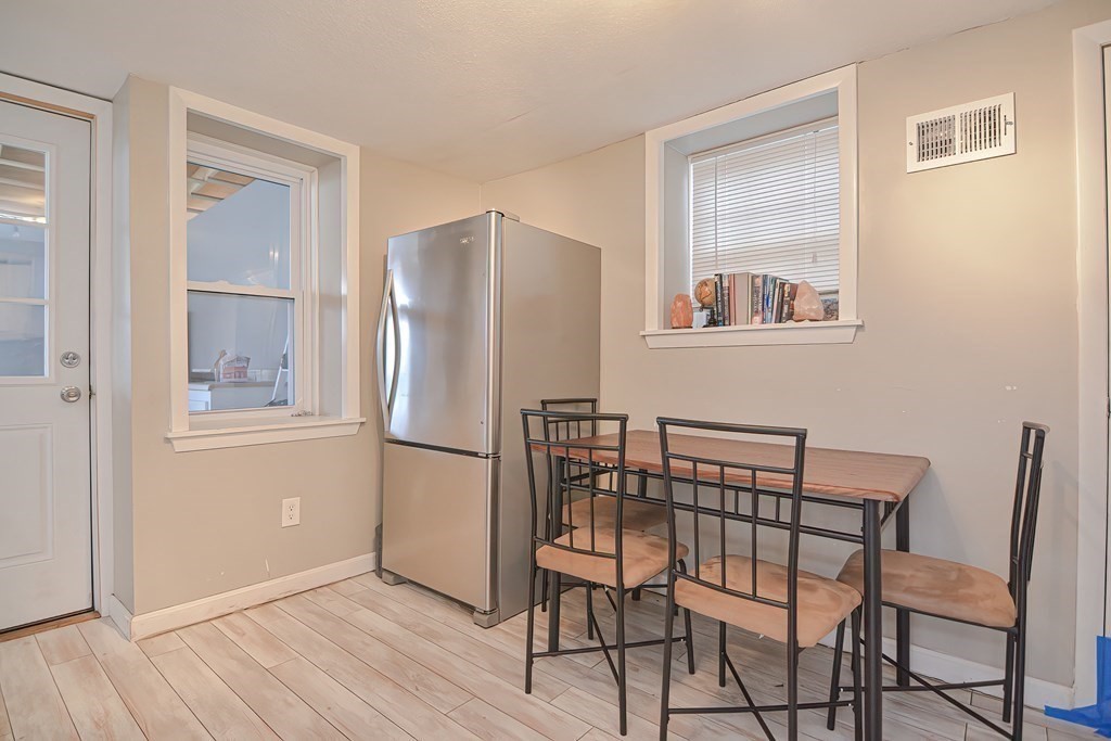 8 Maple Avenue Danvers, MA 01923 - Photo 8 of 42 a view of a dining room with furniture and wooden floor