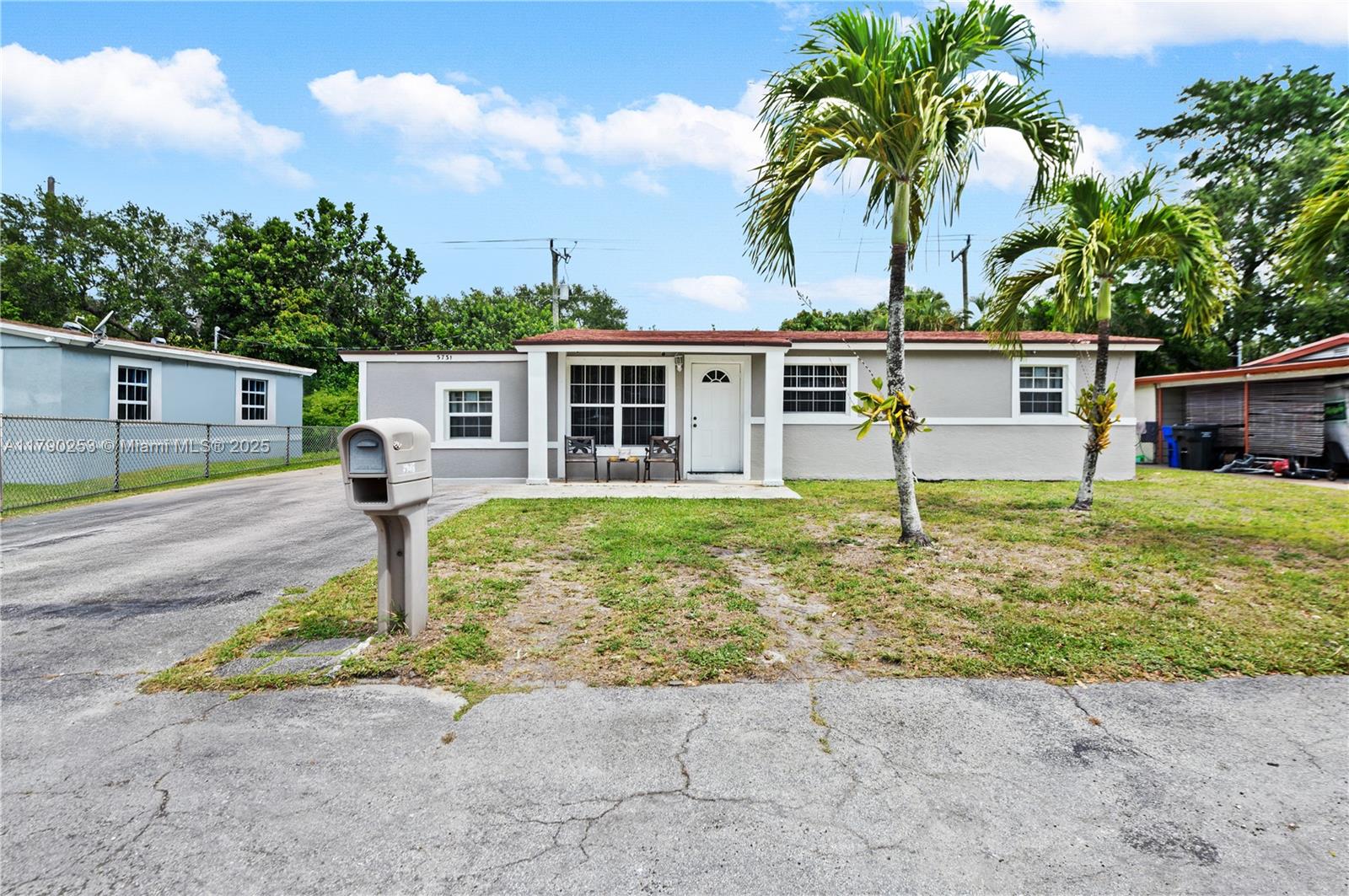 front view of a house with a patio