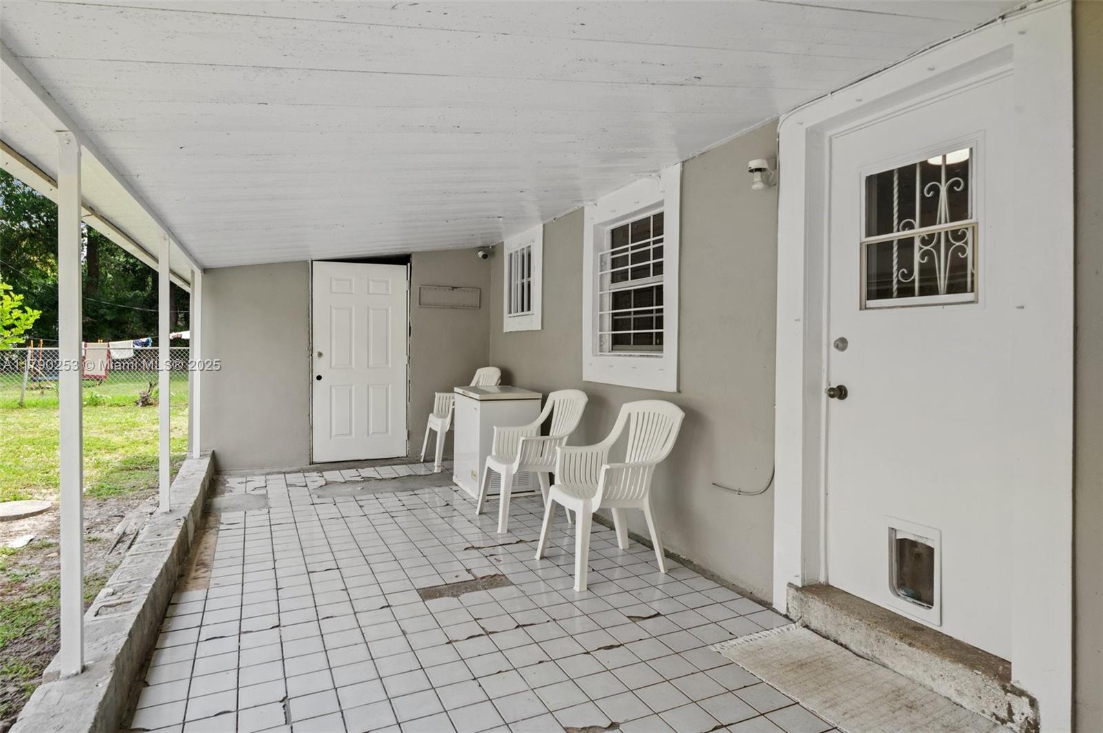 5731 Simms Street Hollywood, FL 33021 - Photo 23 of 33 a view of a dining room with furniture window and outside view