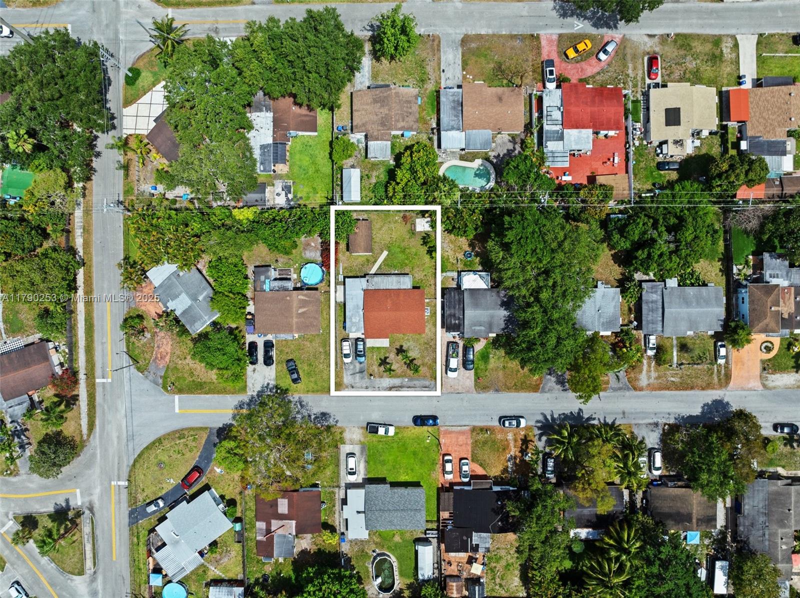 5731 Simms Street Hollywood, FL 33021 - Photo 30 of 33 an aerial view of multiple houses with yard