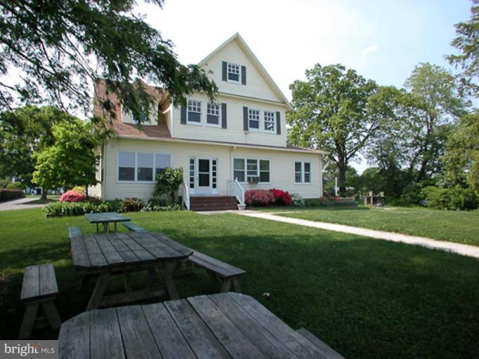 205 Providence Road Annapolis, MD 21409 - Photo 19 of 20 a front view of house with yard and green space