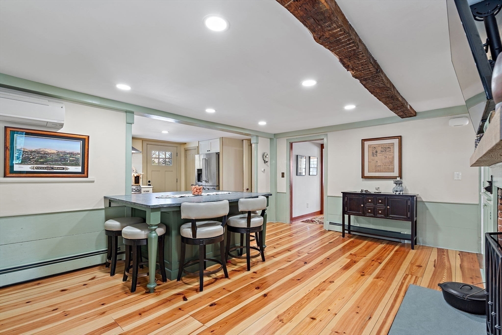 228 Main Street Groton, MA 01450 - Photo 15 of 33 a living room with furniture and wooden floor