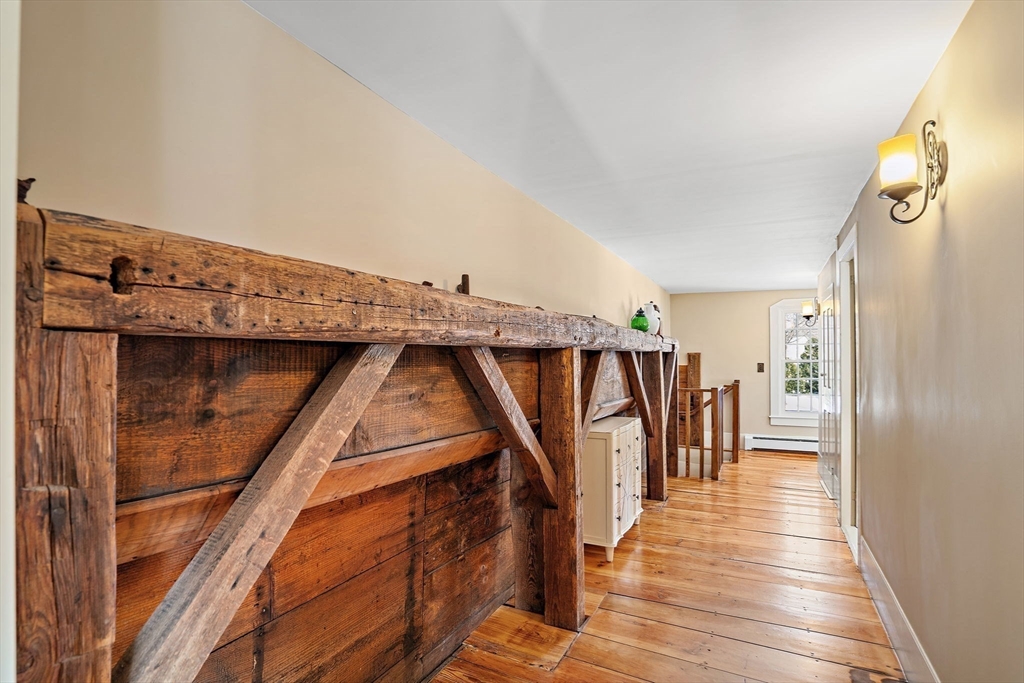 228 Main Street Groton, MA 01450 - Photo 20 of 33 a view of entryway and hall with wooden floor