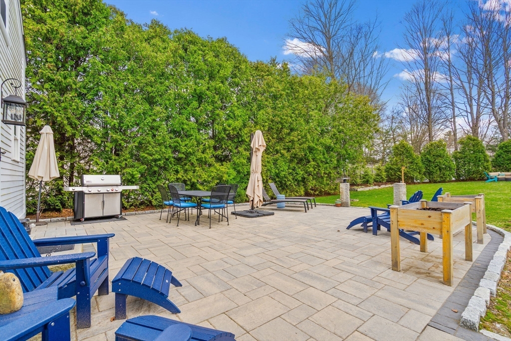 228 Main Street Groton, MA 01450 - Photo 29 of 33 a view of a backyard with sitting area