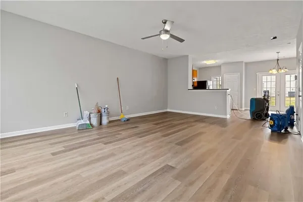 a view of a livingroom with furniture nad wooden floor