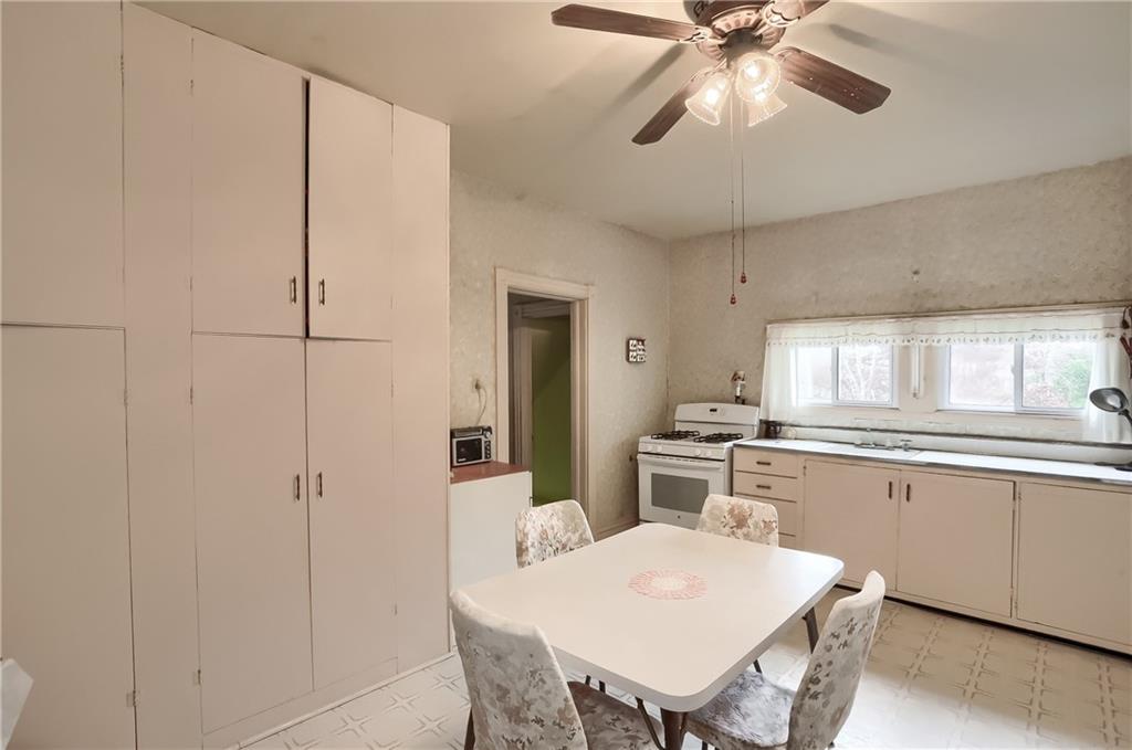 890 Old State Road Apollo, PA 15613 - Photo 14 of 25 a kitchen with stainless steel appliances granite countertop a stove a sink dishwasher and a refrigerator