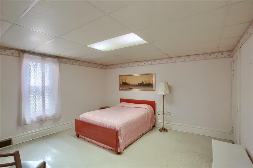 890 Old State Road Apollo, PA 15613 - Photo 17 of 25 a bedroom with a bed and window