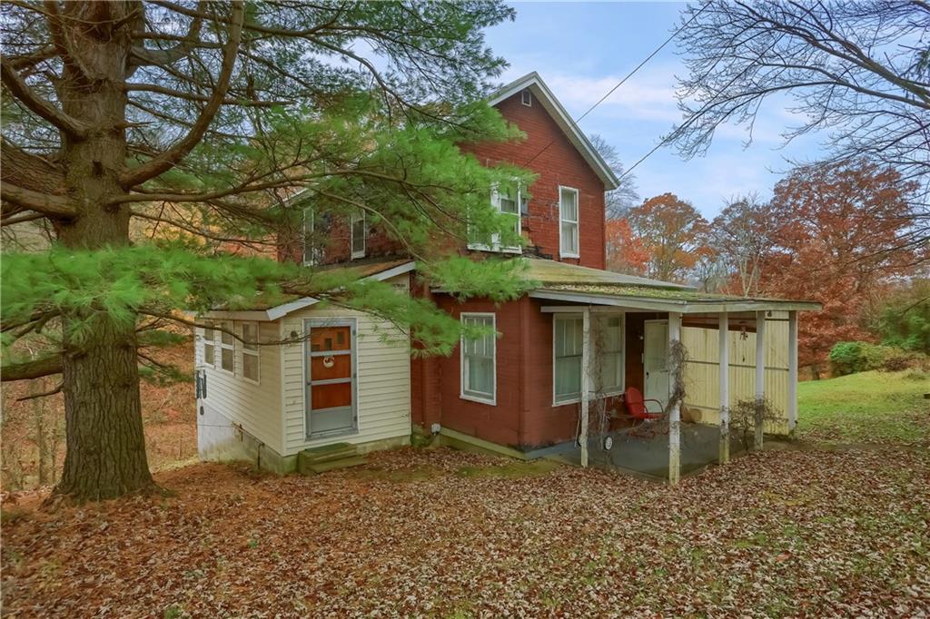 890 Old State Road Apollo, PA 15613 - Photo 2 of 25 a view of a house with a yard and large tree