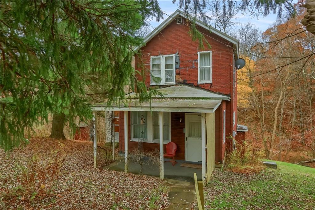 890 Old State Road Apollo, PA 15613 - Photo 3 of 25 a view of a house with a yard