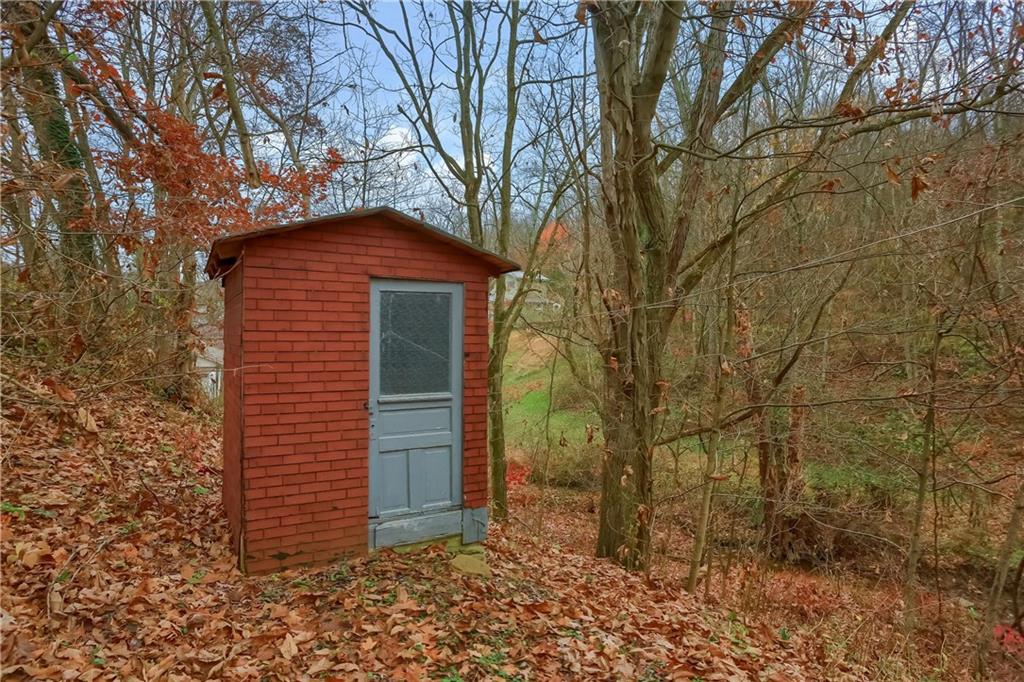 890 Old State Road Apollo, PA 15613 - Photo 6 of 25 a front view of a house with a yard