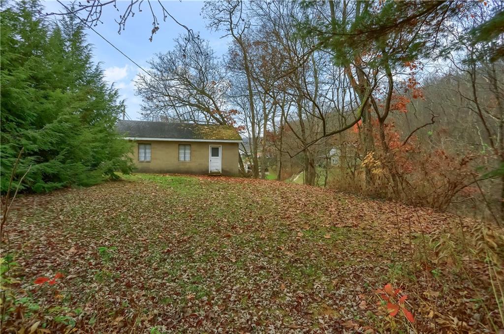 890 Old State Road Apollo, PA 15613 - Photo 7 of 25 a front view of a house with a yard