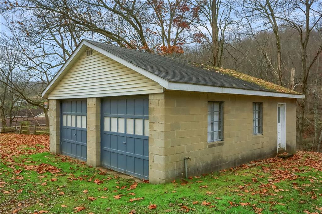 890 Old State Road Apollo, PA 15613 - Photo 8 of 25 a front view of a house with a garden