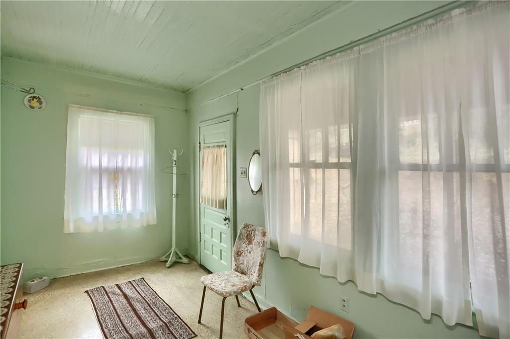 890 Old State Road Apollo, PA 15613 - Photo 9 of 25 a living room with furniture and a window