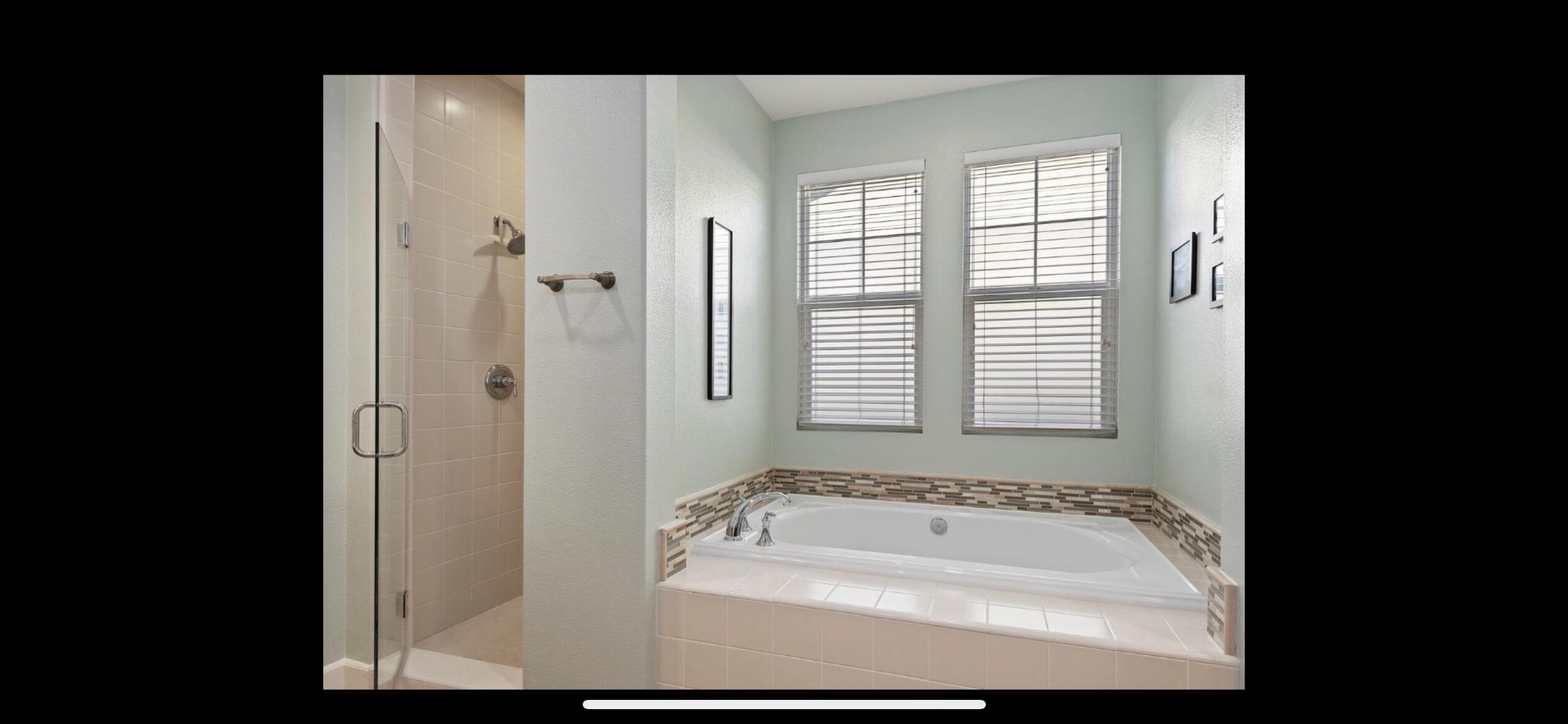 Undisclosed Address Carpinteria, CA 93013 - Photo 6 of 12 a bathroom with a bathtub and a shower