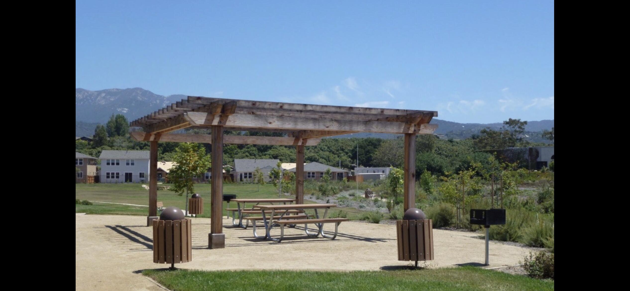 Undisclosed Address Carpinteria, CA 93013 - Photo 9 of 12 a view of a patio with a table and chairs